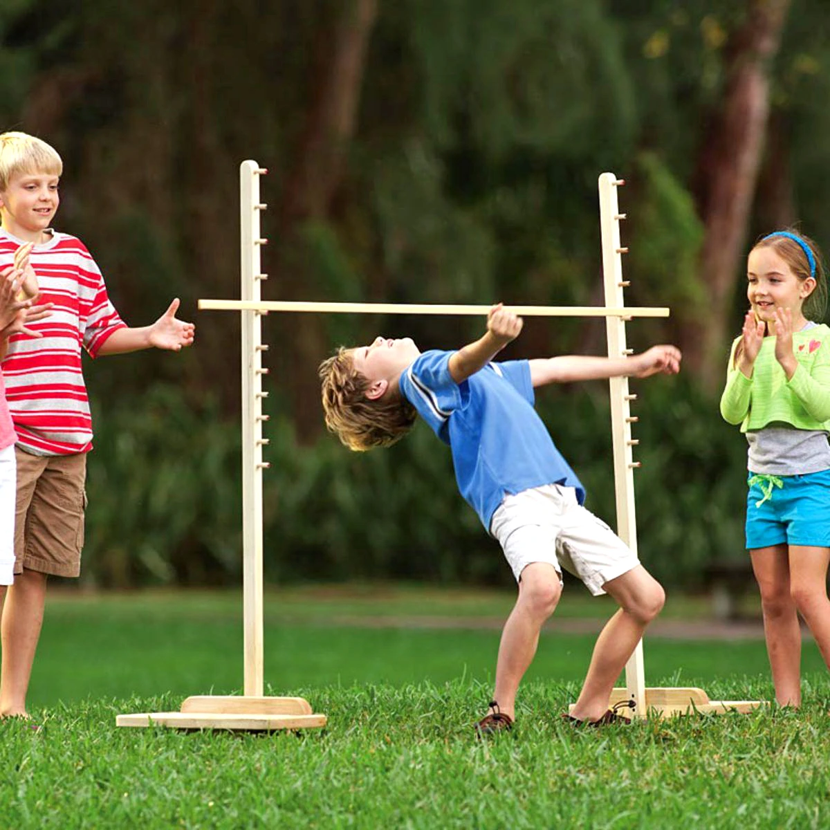 Kids participating in limbo and interactive party games at a Detroit event